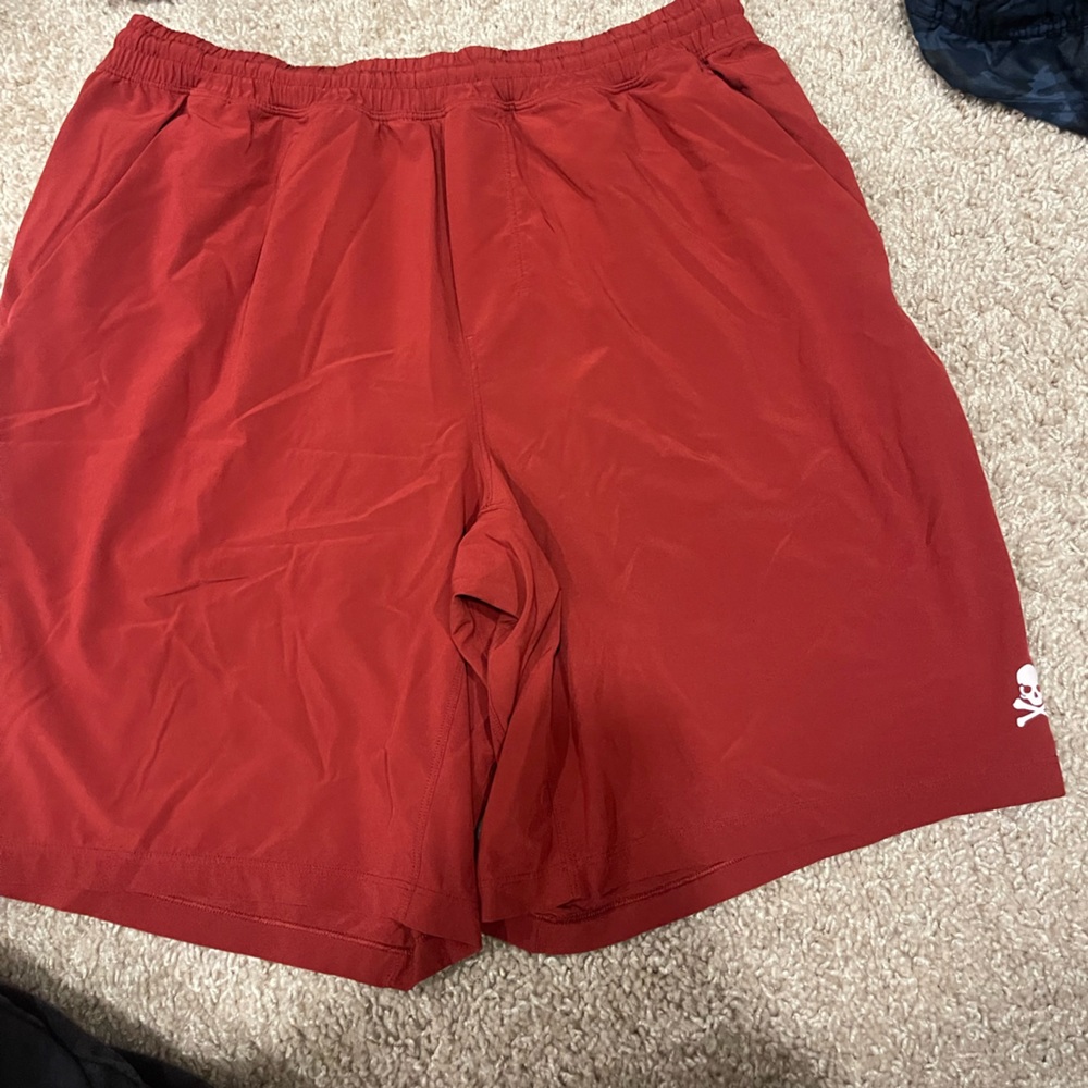 Red lululemon men’s athletic shorts